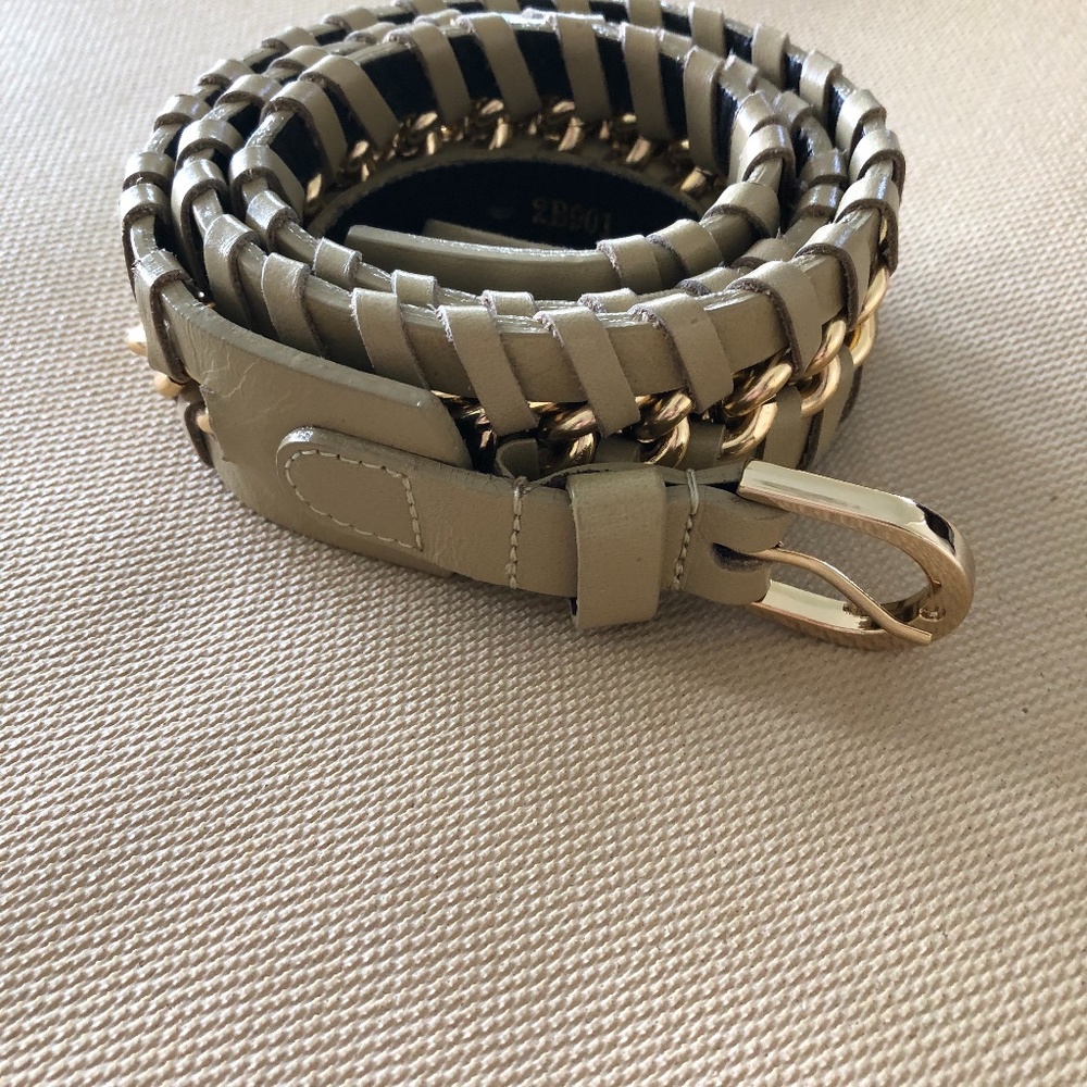 Leather and brass woven belt.